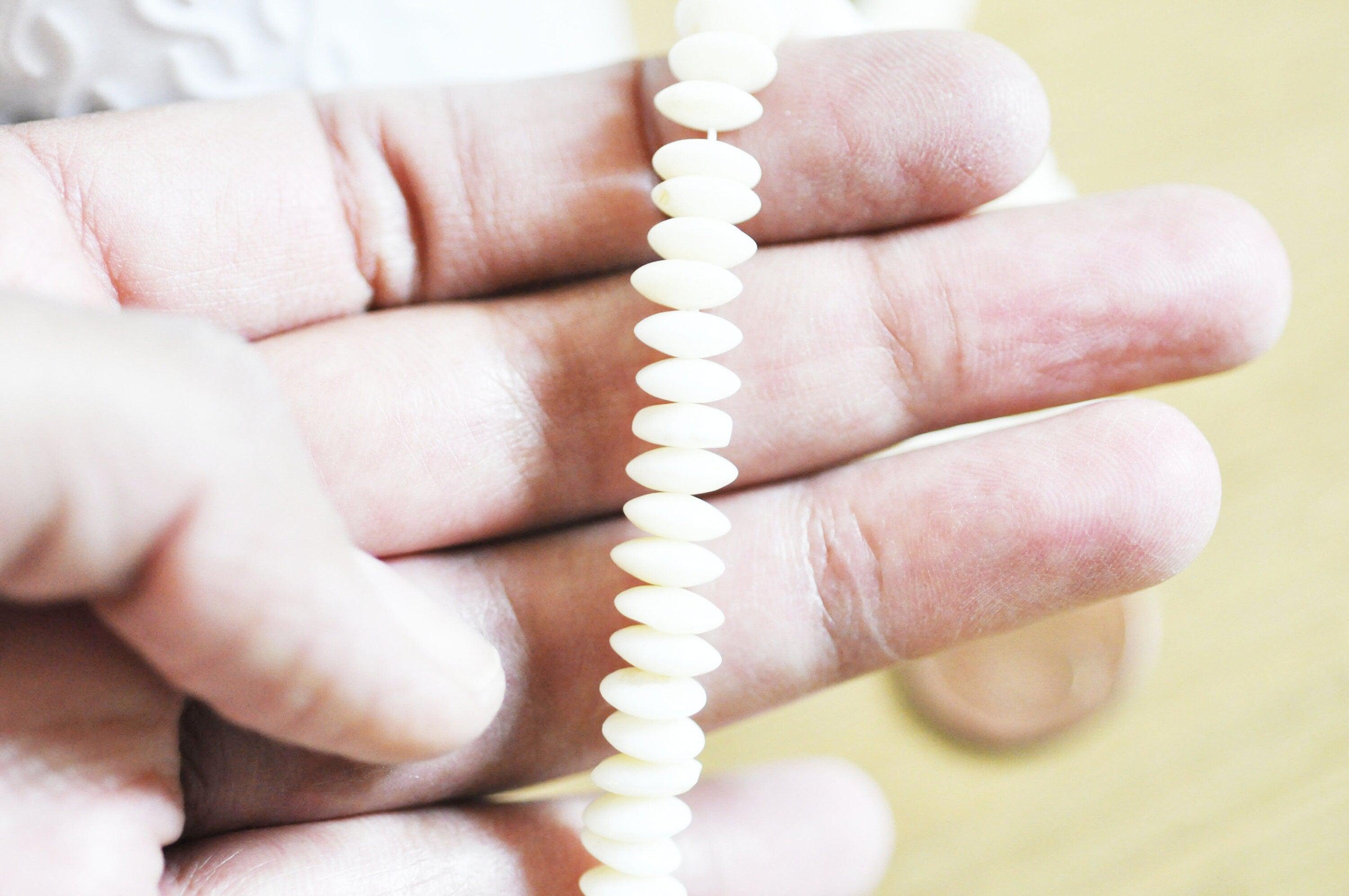 Gingerlily Perles rondelles G4781 bambou blanc 7mm fil 120