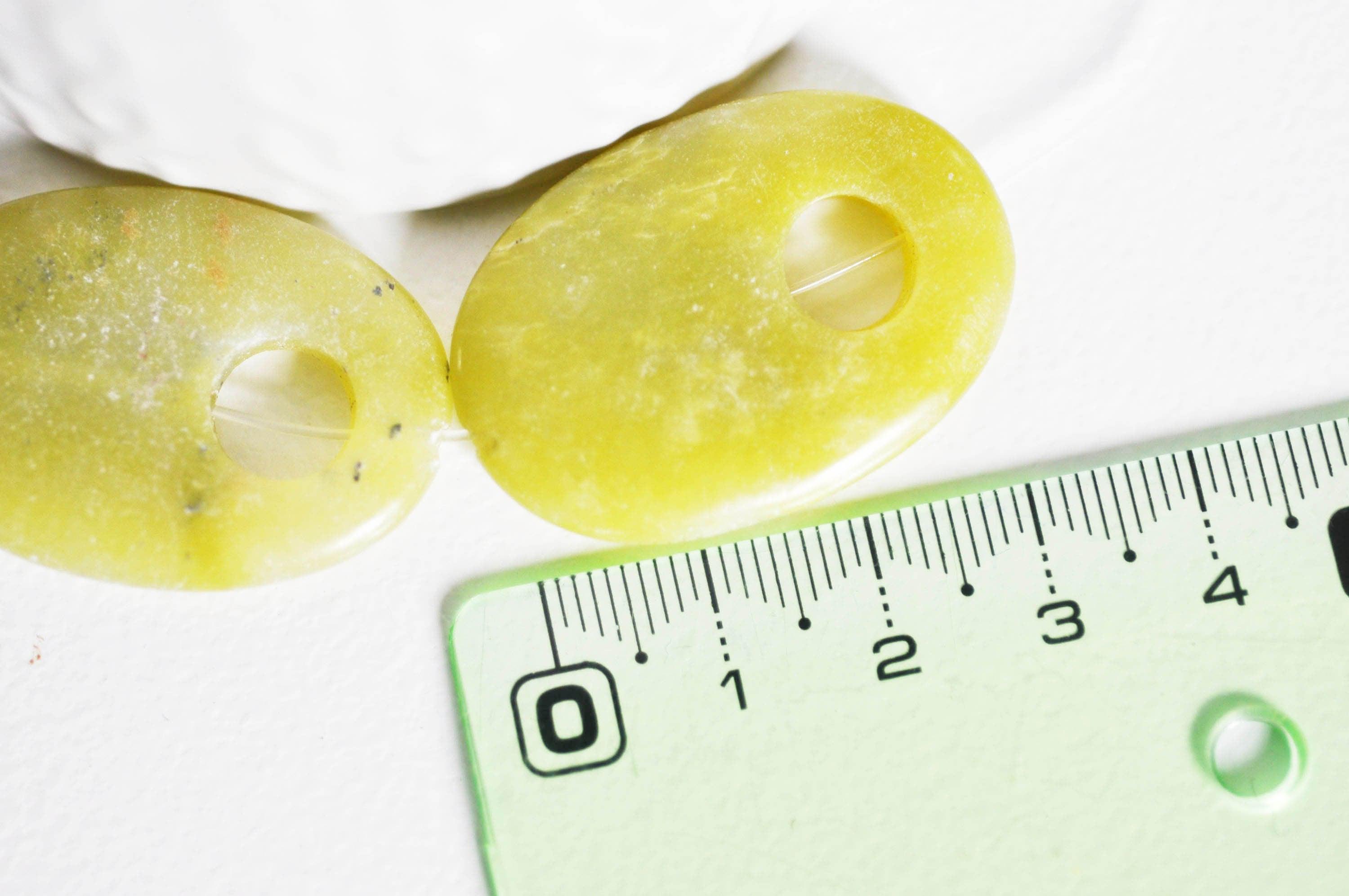 Gingerlily Perle ovale jade jaune 32 mm pierre naturelle x1