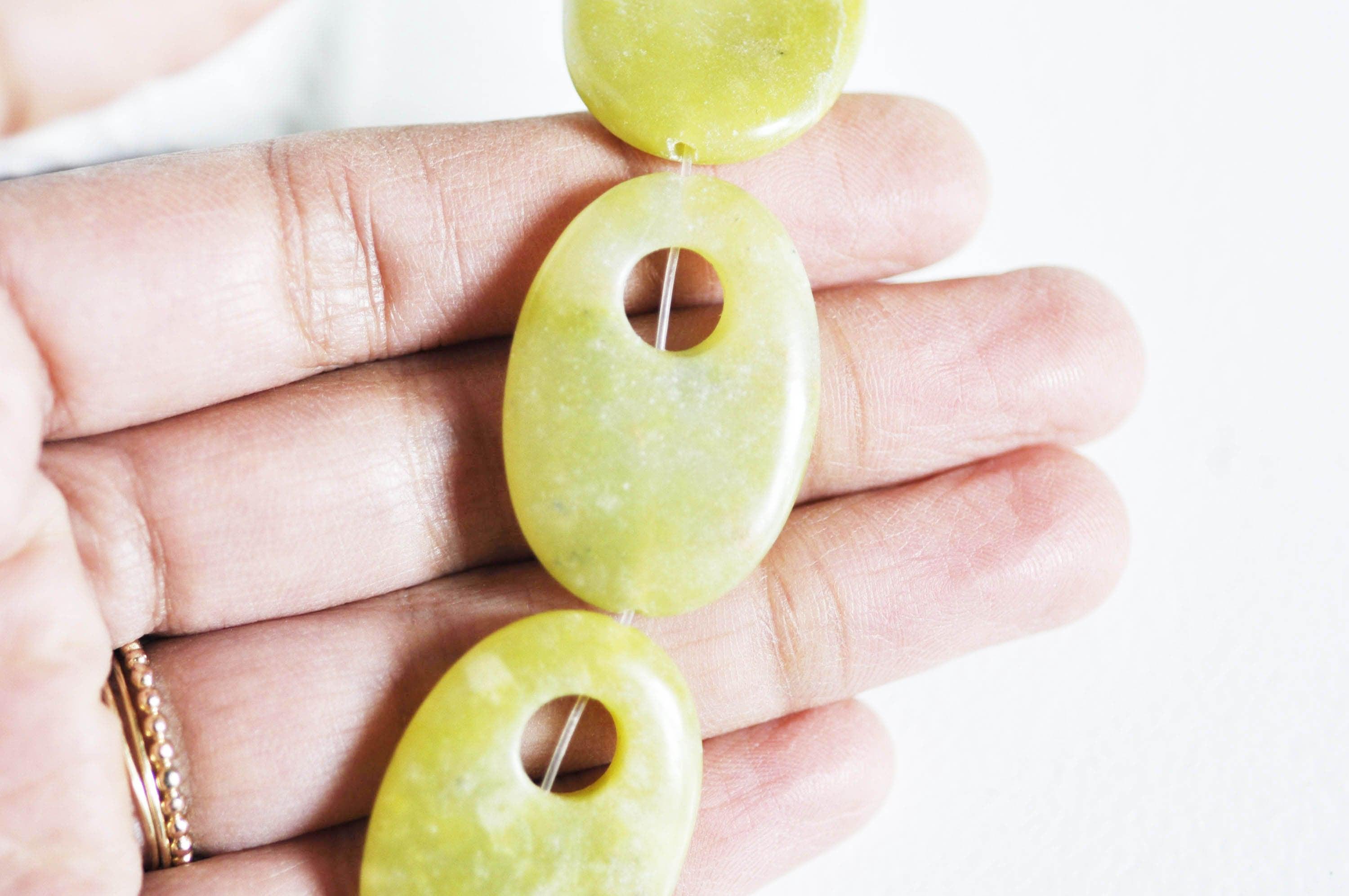 Gingerlily Perle ovale jade jaune 32 mm pierre naturelle x1