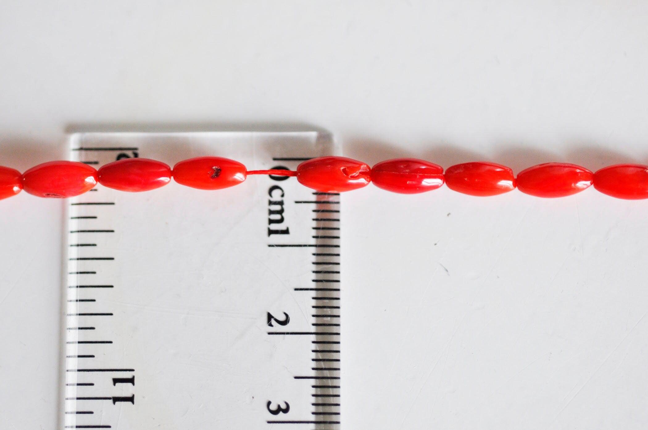 Gingerlily Perles ovales corail rouge 4x8mm fil 39cm