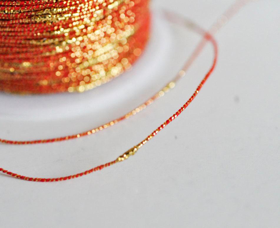 Gingerlily Perles G1489 cordon rouge or 1,5mm 1 mètre nylon