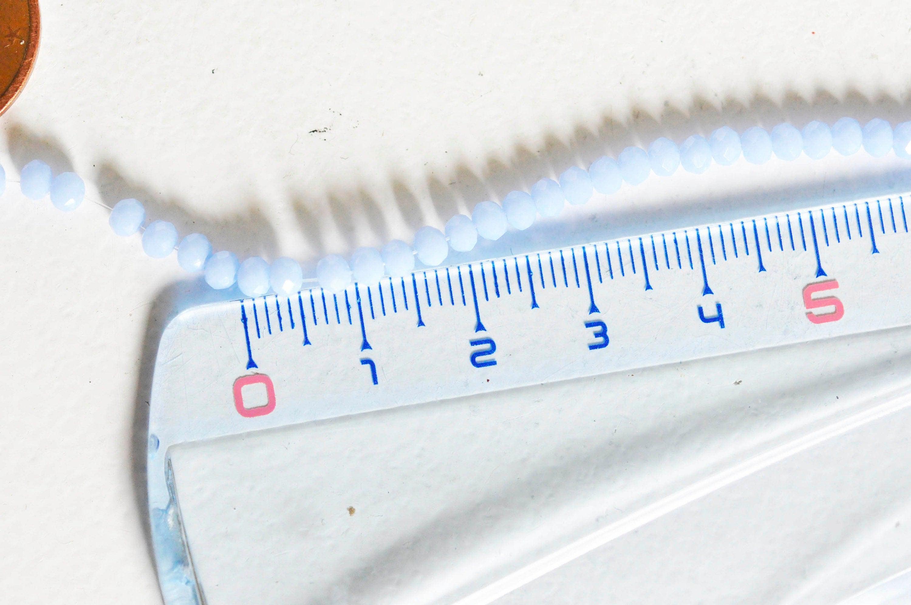 Gingerlily perles toupies cristal bleu lavande 3x2mm fil 135