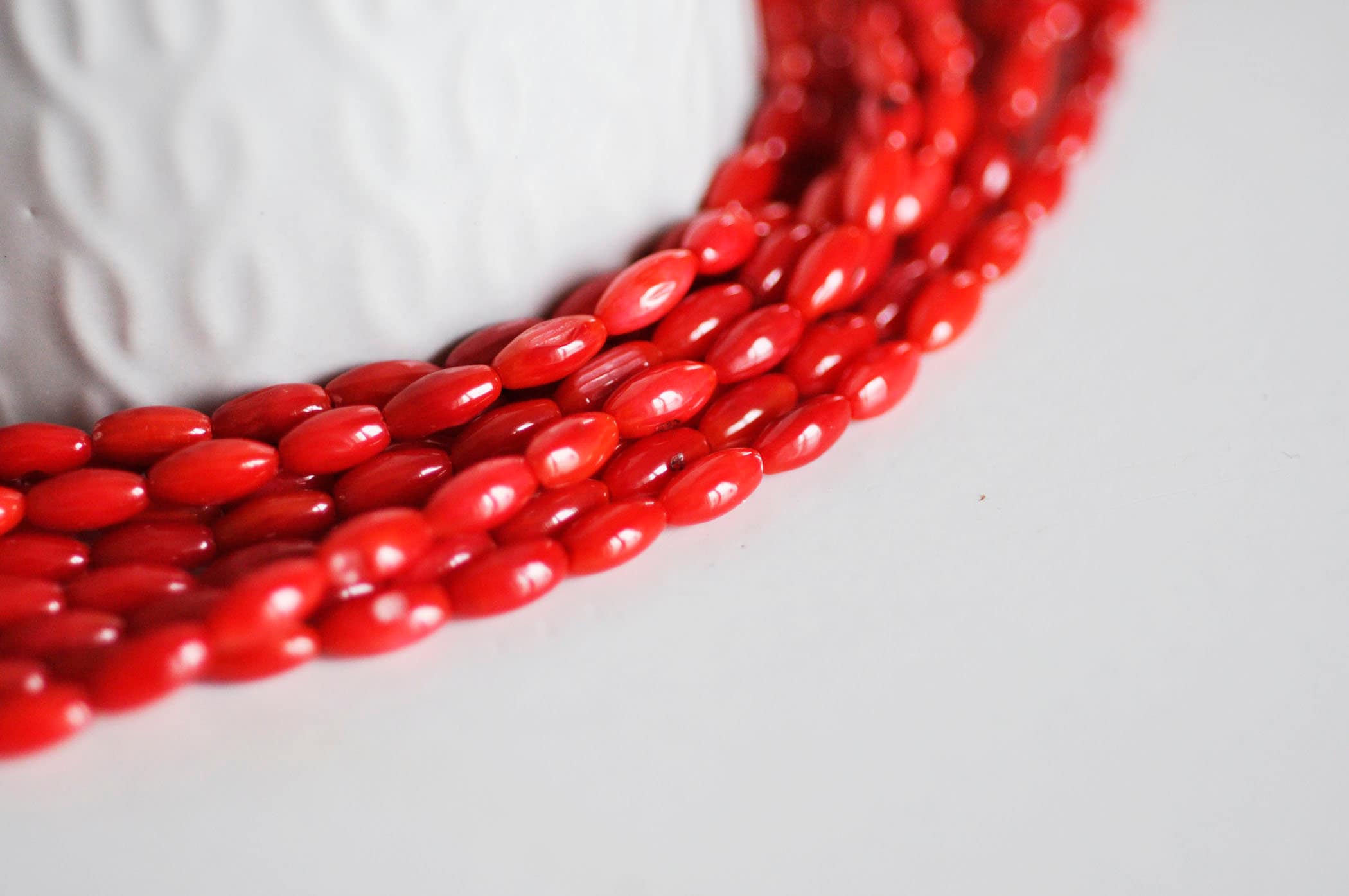 Gingerlily Perles ovales corail rouge 4x8mm fil 39cm