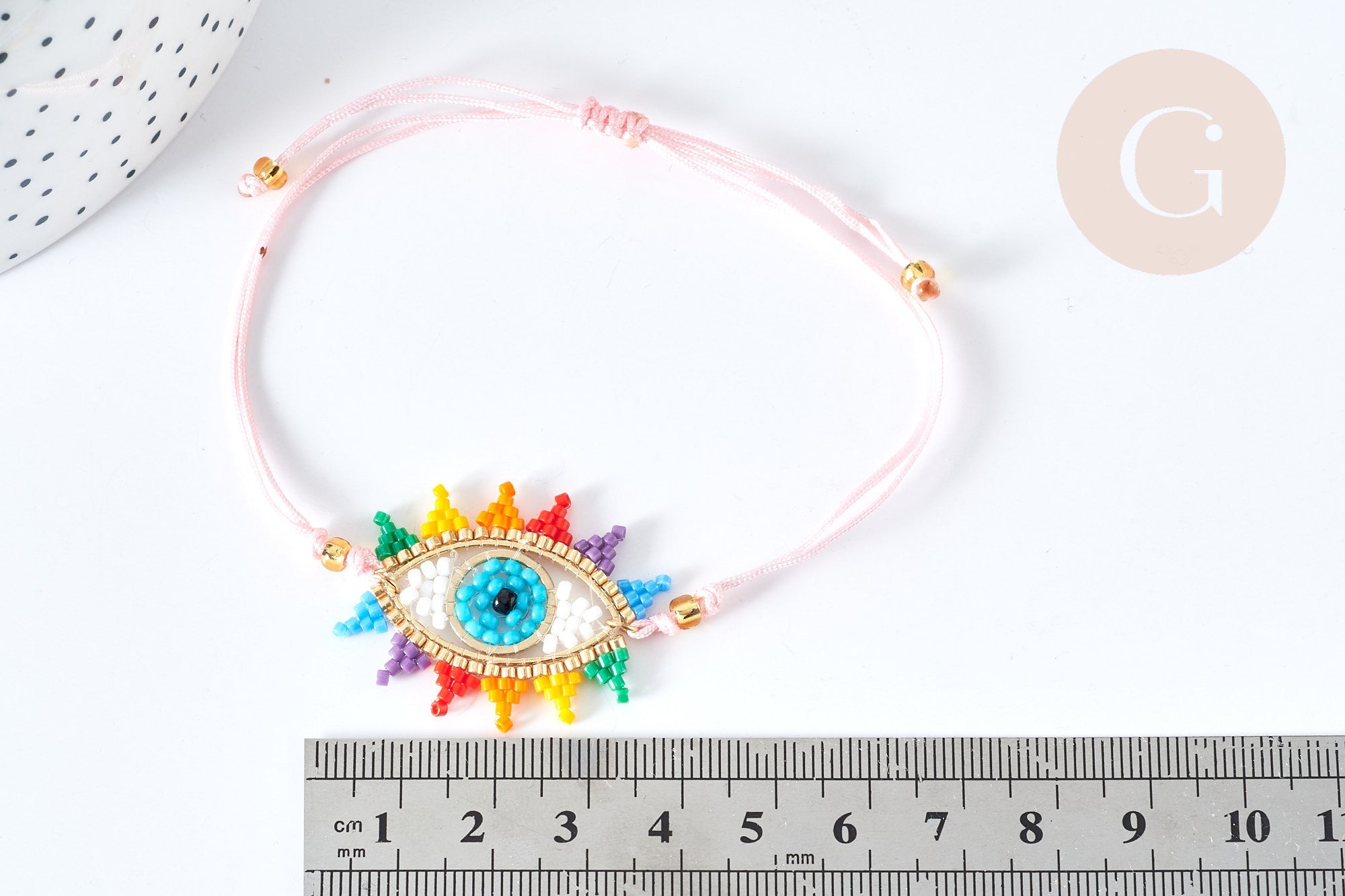 Gingerlily Perles G7689 bracelet mauvais œil rose 28 cm nylon