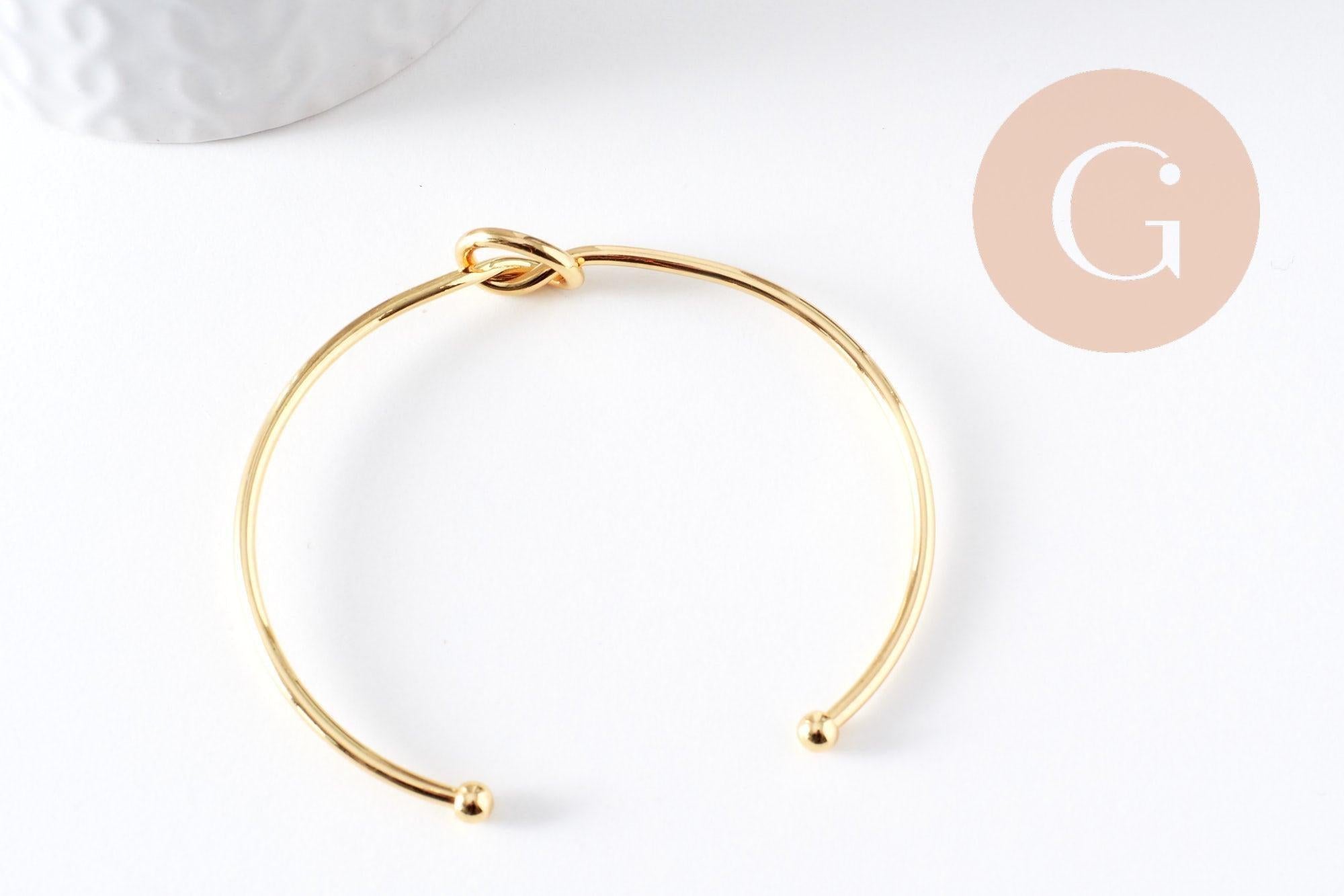 Gingerlily Accessoires G10312 bracelet jonc nœud doré 53x62 mm