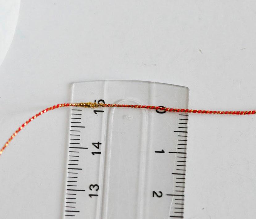Gingerlily Perles G1489 cordon rouge or 1,5mm 1 mètre nylon