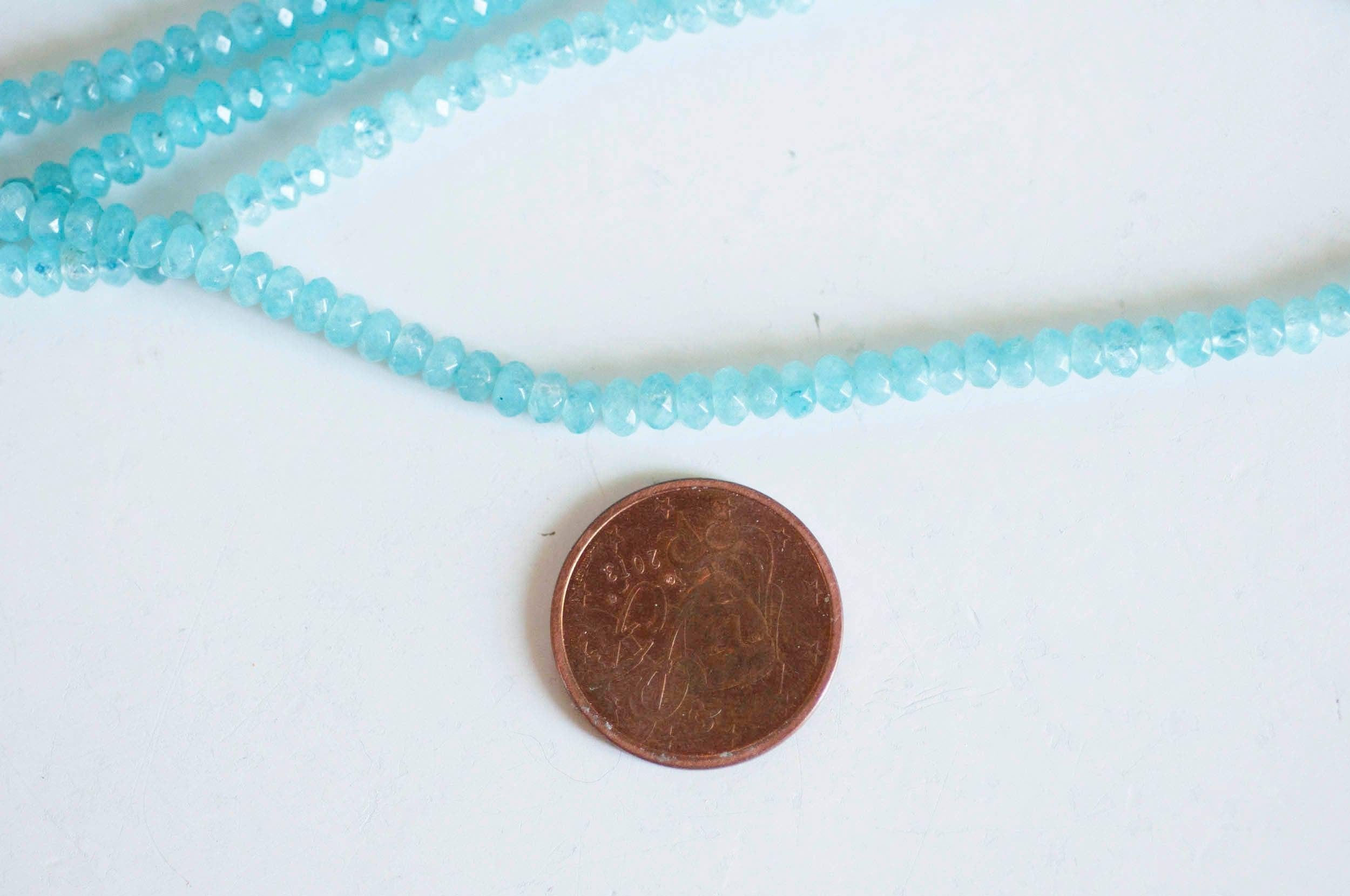 Gingerlily Perle abacus jade bleu 4x2mm fil 137 perles facettées