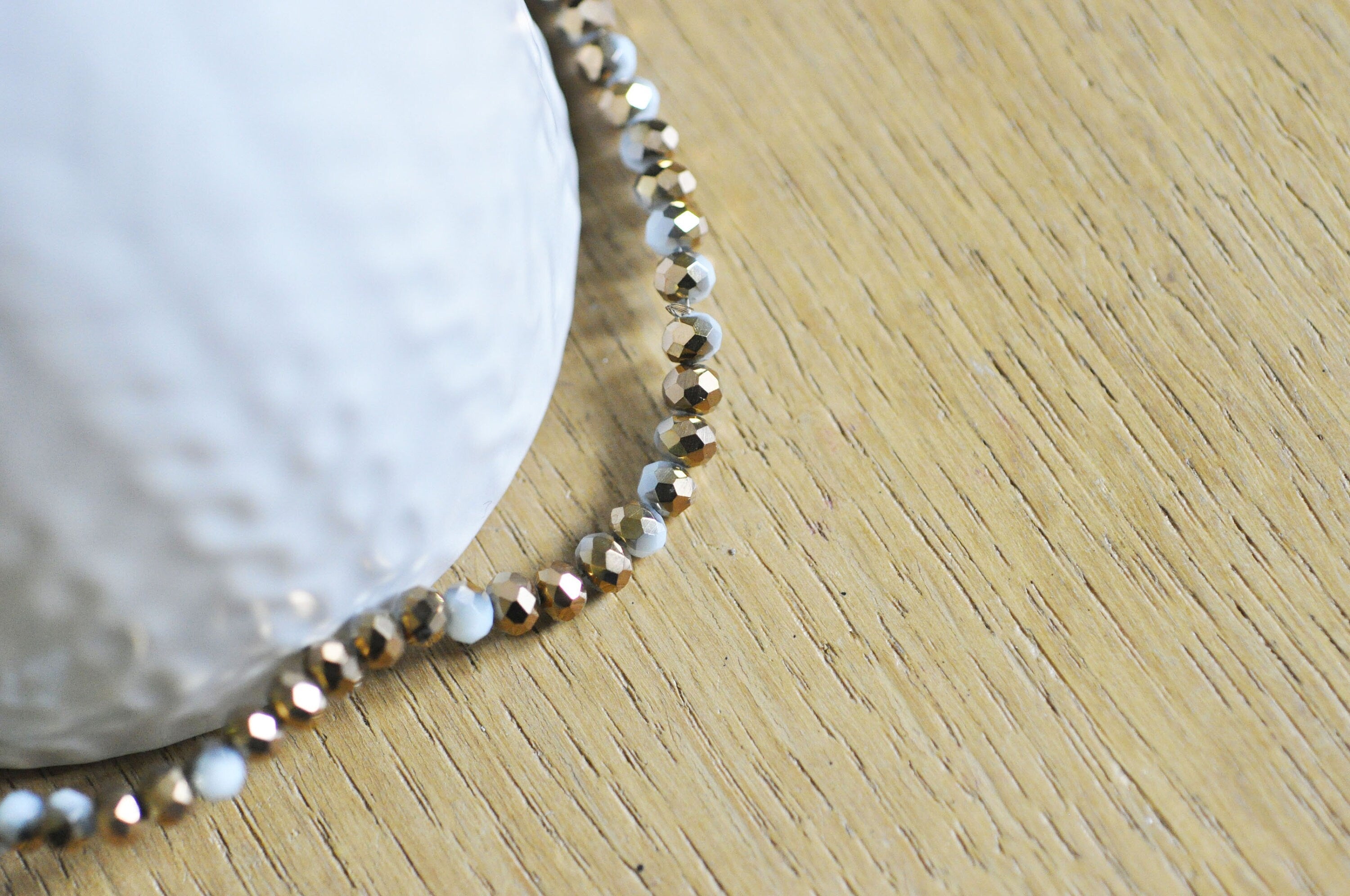 Gingerlily Perles toupies cristal blanc doré 4x3mm fil 120