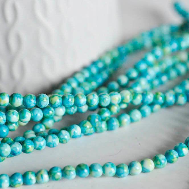 Gingerlily Perles jade océan bleu 4mm fil 35cm