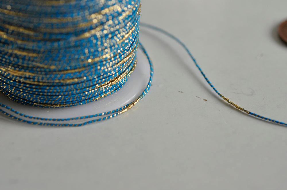 Gingerlily Perles cordon bleu or nylon 1.5mm 1m G301