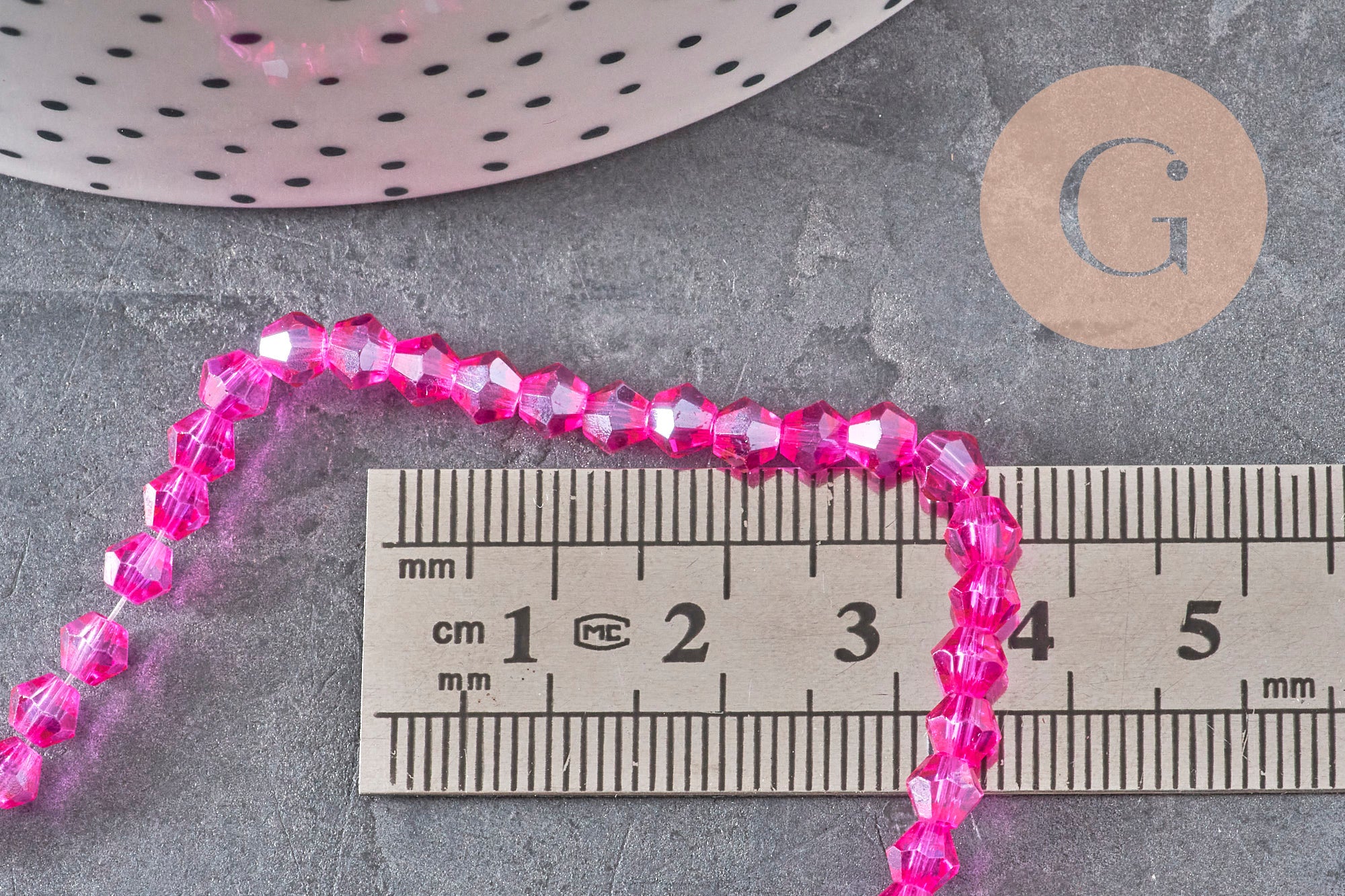 Gingerlily Perles toupies cristal rose fuchsia irisé 4.5mm fil 28cm