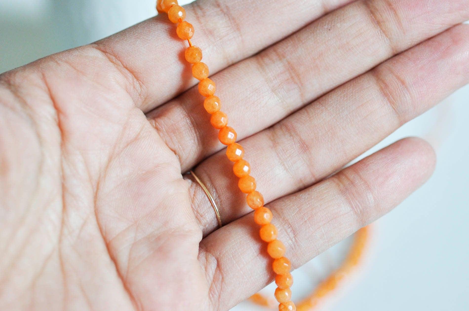 Gingerlily Perles Perle jade G0270 facettée orange 4mm fil 90