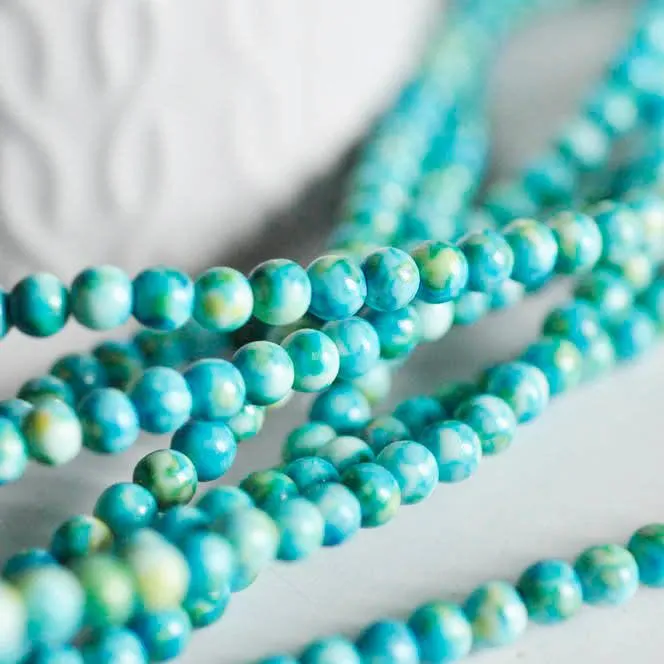 Gingerlily Perles jade océan bleu 4mm fil 35cm