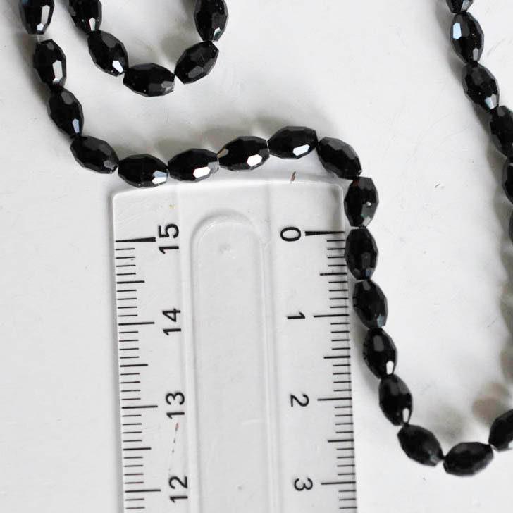 Gingerlily Perles verre noir grain de riz 6mm fil de 70