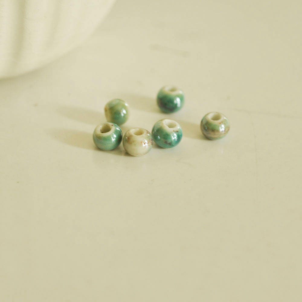 Gingerlily Perles G2106 perle porcelaine vert irisé 7mm x5