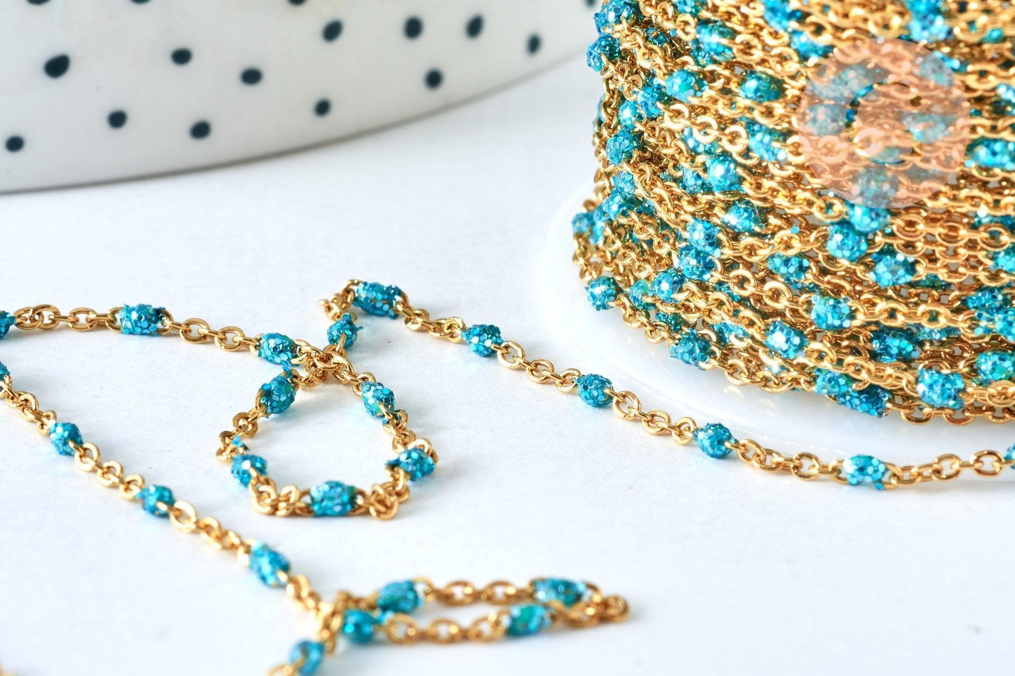 Gingerlily Chaînes G6892 chaîne acier doré résine bleue 1 m