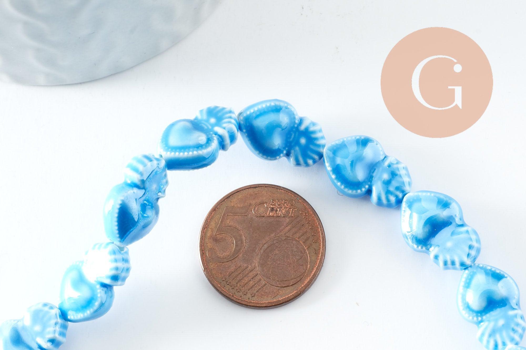 Gingerlily Perle porcelaine coeur bleu clair 16mm x24 irisé