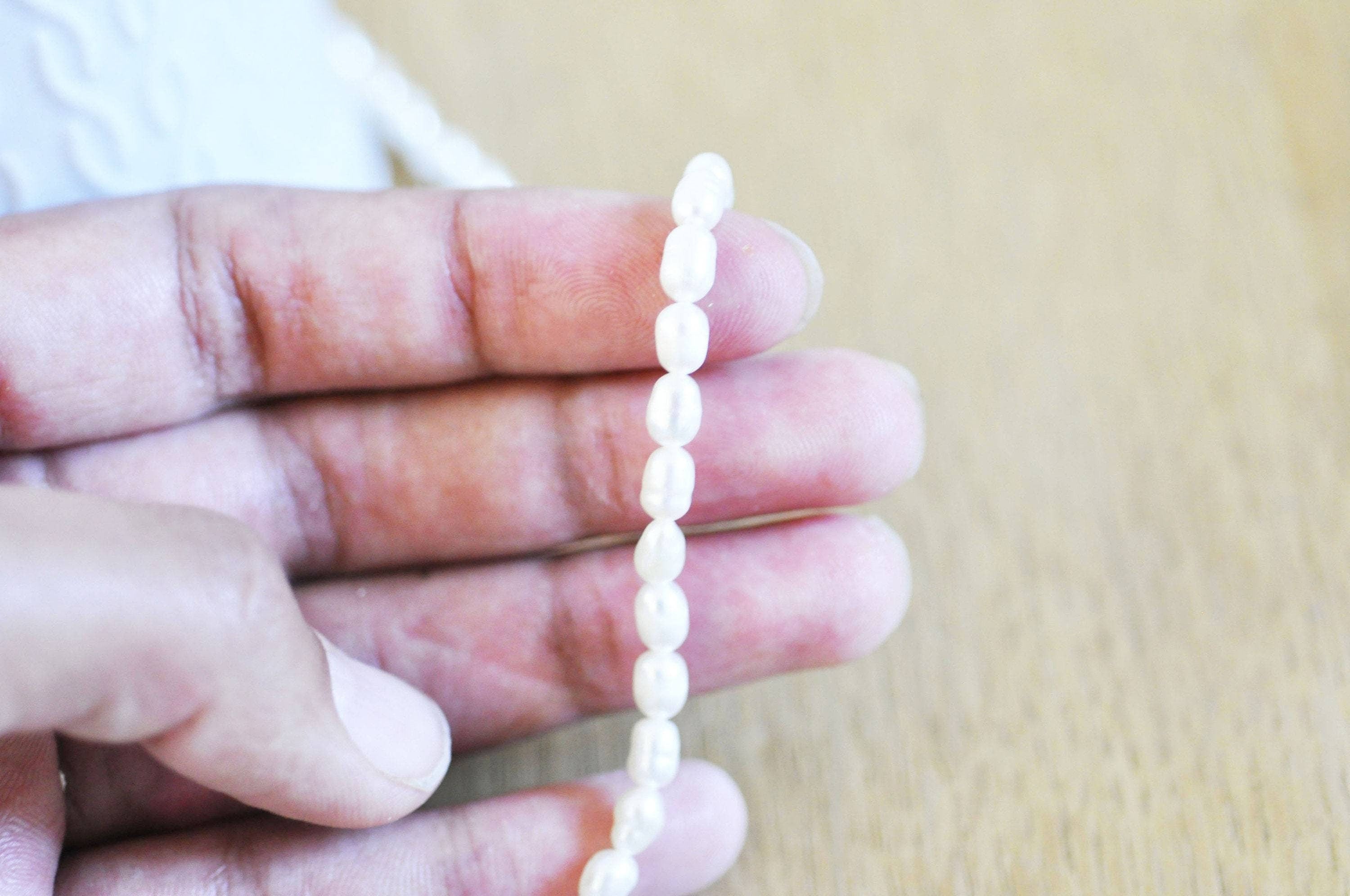 Gingerlily Perles G2836 perles eau douce blanches 4-5mm fil