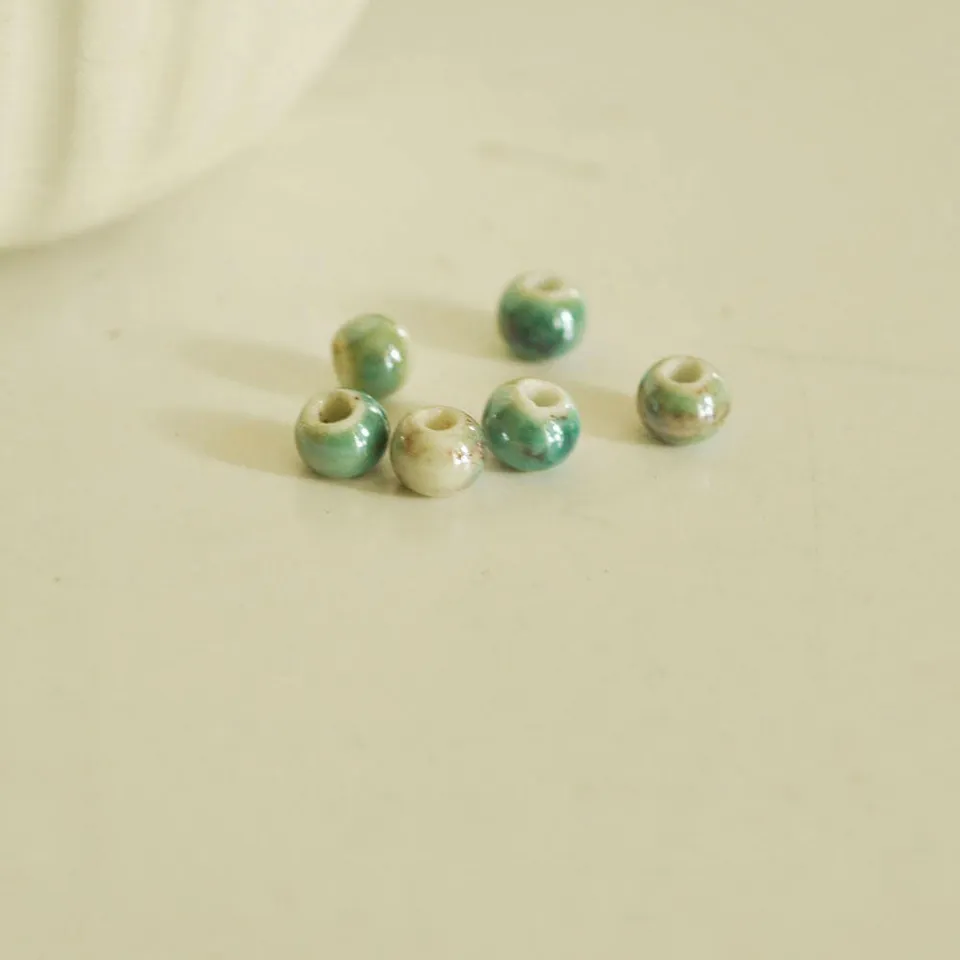 Gingerlily Perles G2106 perle porcelaine vert irisé 7mm x5