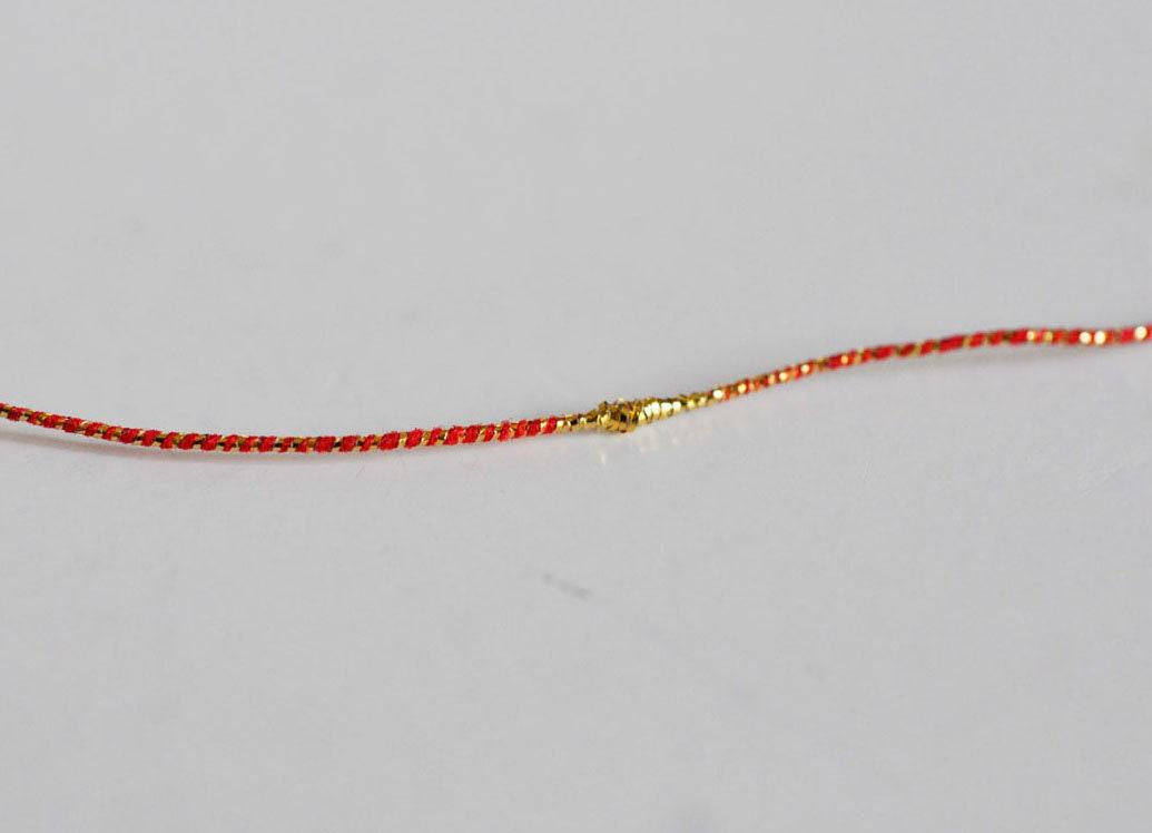 Gingerlily Perles G1489 cordon rouge or 1,5mm 1 mètre nylon