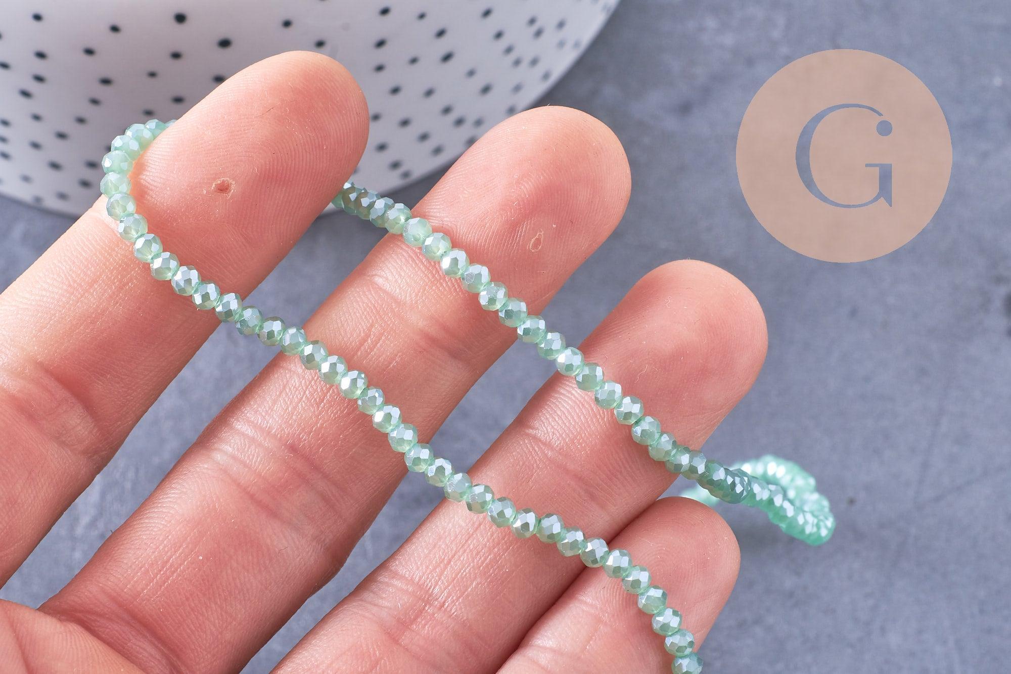 Gingerlily Perles cristal vert irisé 3x2mm fil 40cm G10616