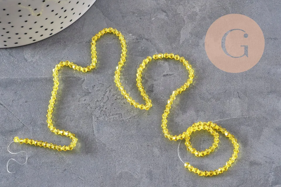 Gingerlily perles cristal toupies G11110 jaune transparent 3mm fil 38cm