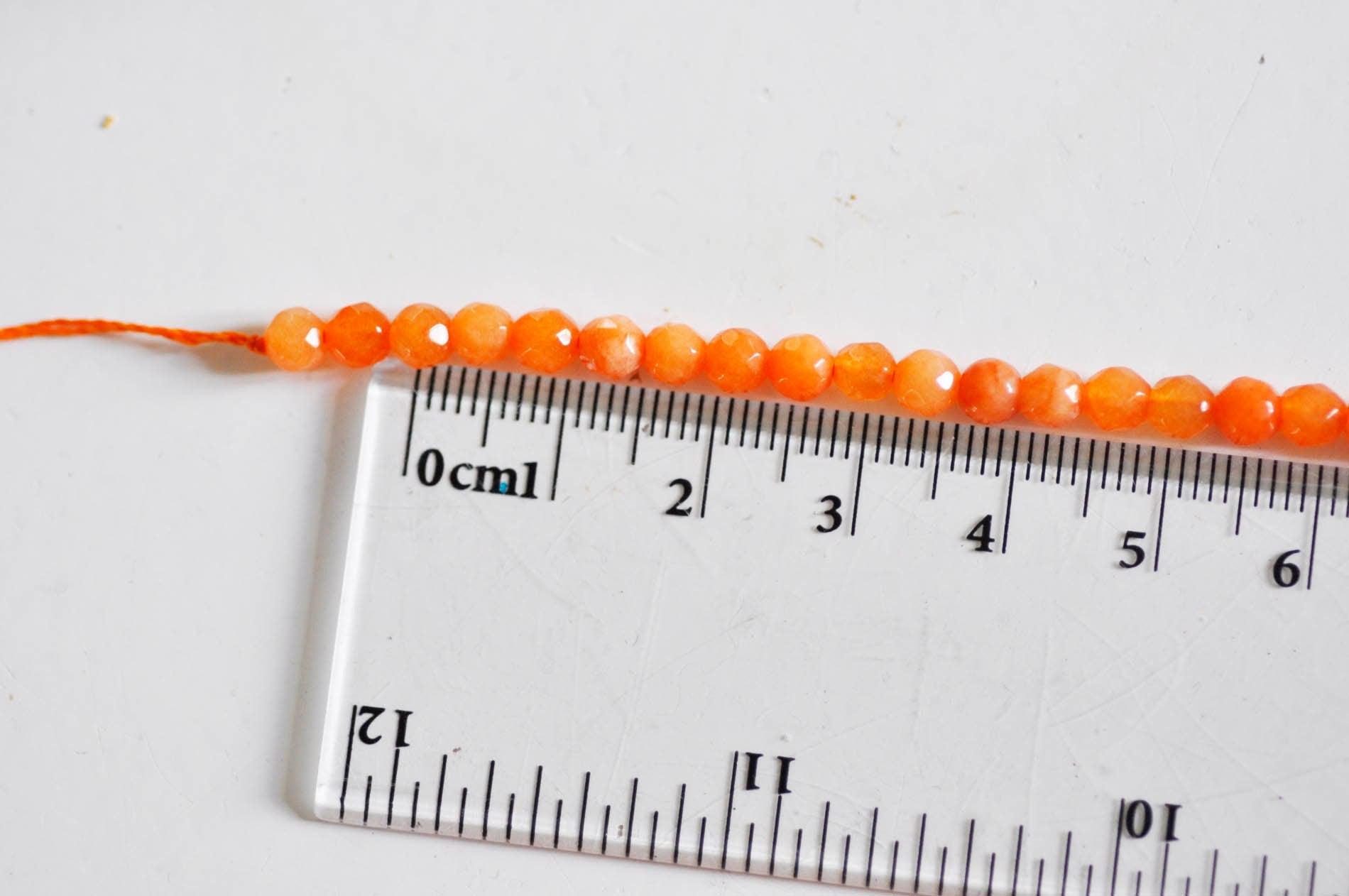 Gingerlily Perles Perle jade G0270 facettée orange 4mm fil 90