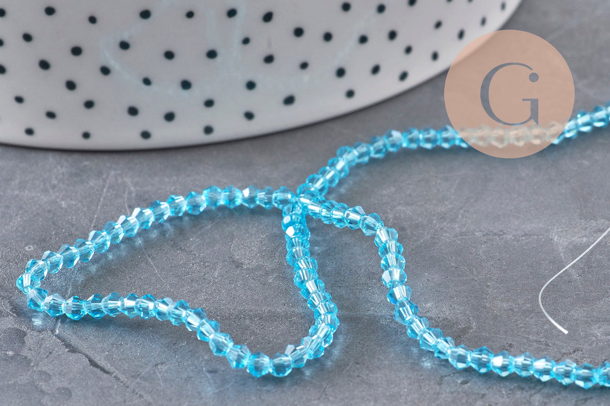Gingerlily Perles toupies cristal bleu 3mm fil 38cm