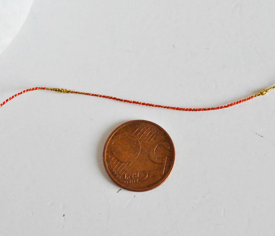 Gingerlily Perles G1489 cordon rouge or 1,5mm 1 mètre nylon