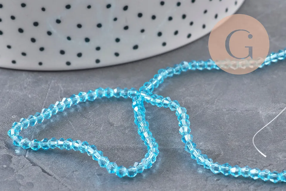 Gingerlily Perles toupies cristal bleu 3mm fil 38cm
