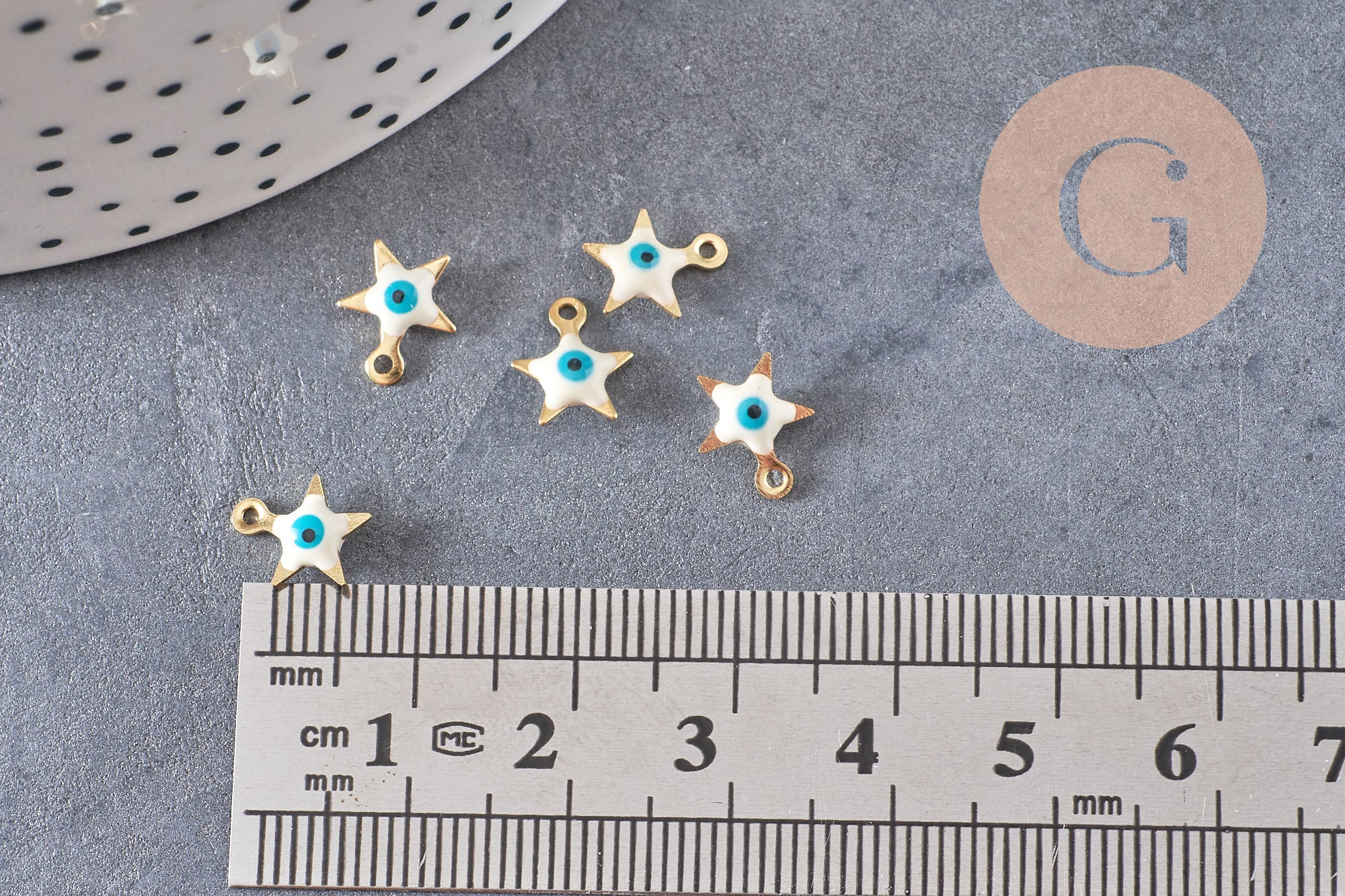 Gingerlily Étoile Oeil Acier Doré 9mm x10 Pendentif