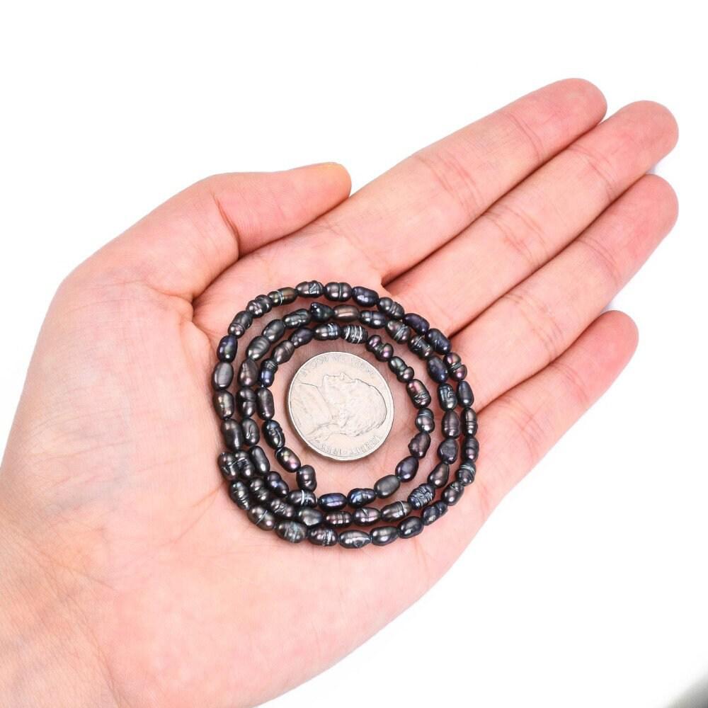 Gingerlily Perles eau douce noires 4.5-7mm fil 70 G6177