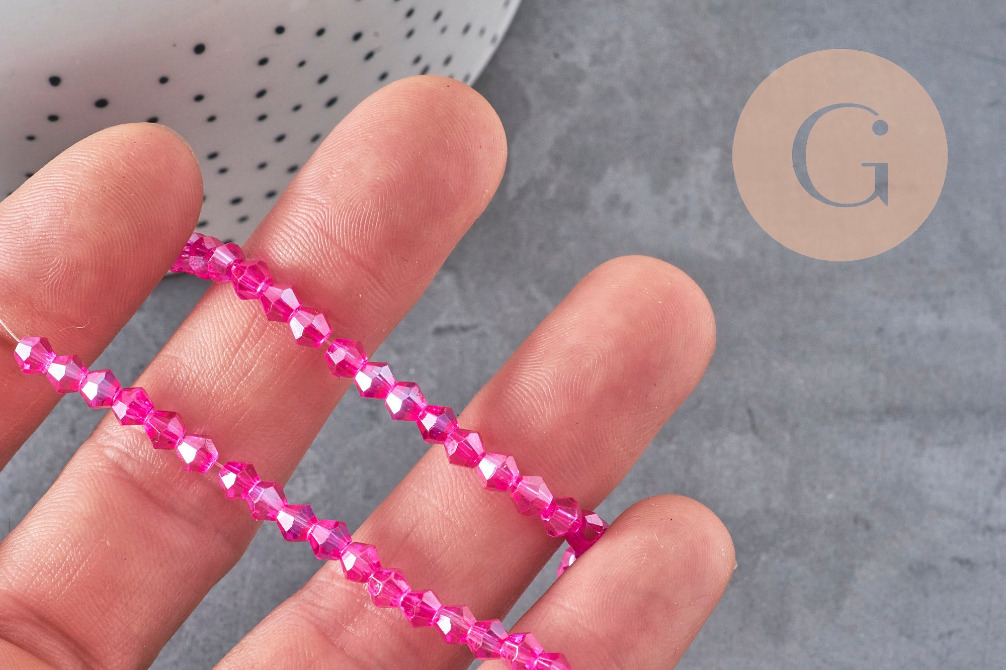 Gingerlily Perles toupies cristal rose fuchsia irisé 4.5mm fil 28cm