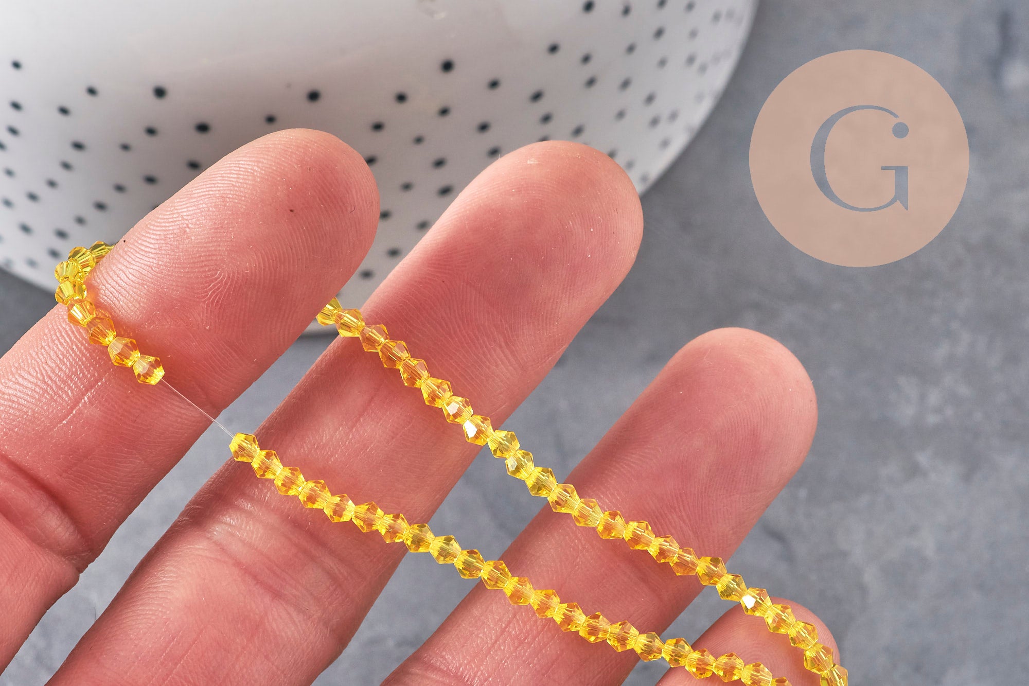 Gingerlily perles cristal toupies G11110 jaune transparent 3mm fil 38cm