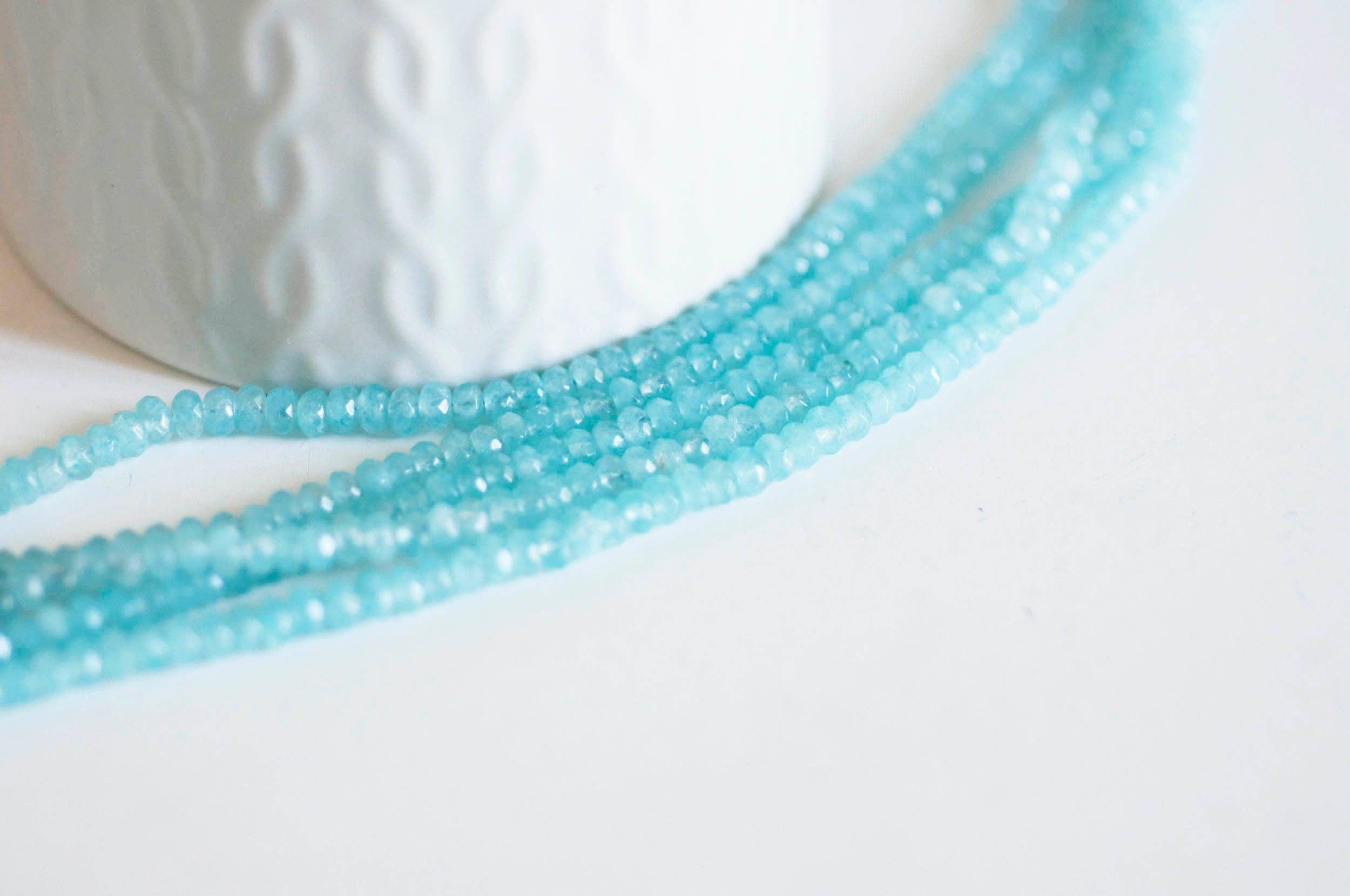 Gingerlily Perle abacus jade bleu 4x2mm fil 137 perles facettées