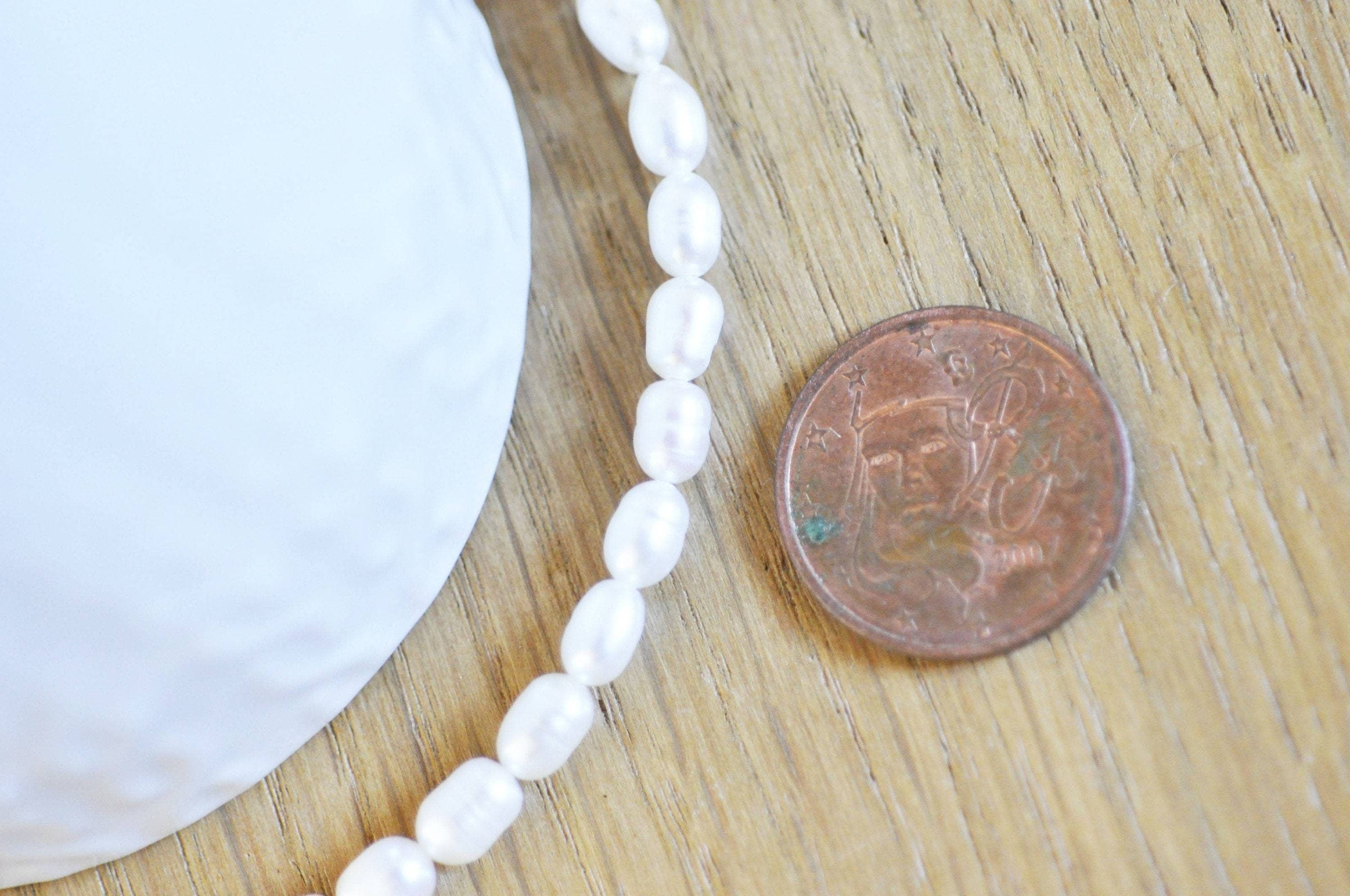 Gingerlily Perles G2836 perles eau douce blanches 4-5mm fil