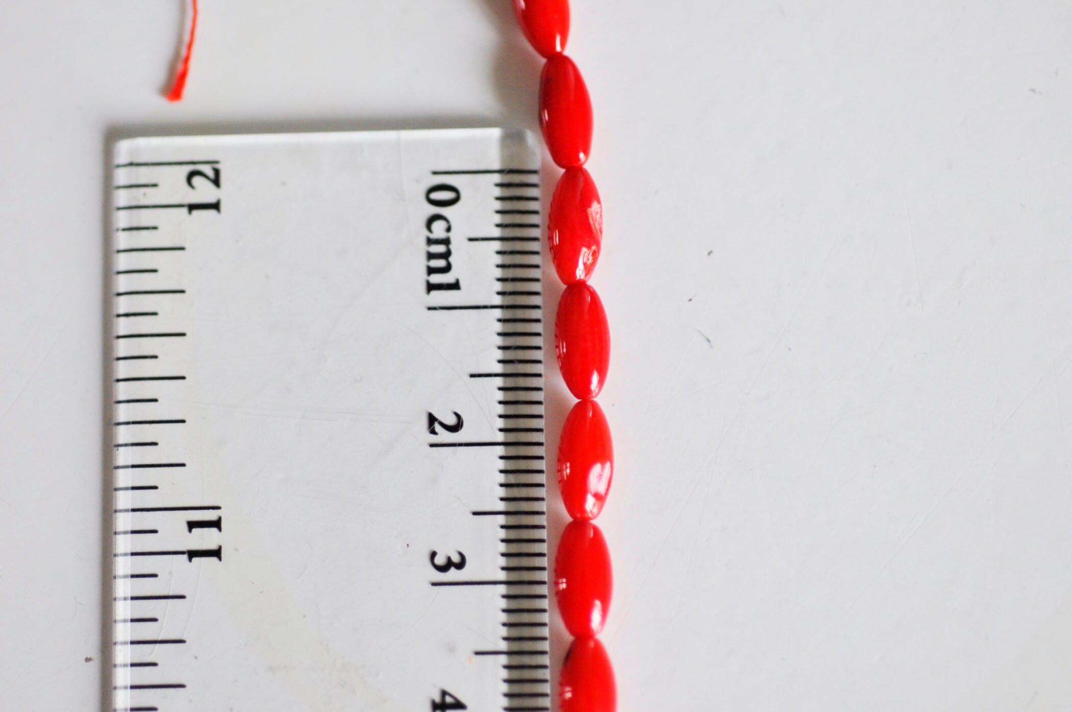 Gingerlily Perles ovales corail rouge 4x8mm fil 39cm