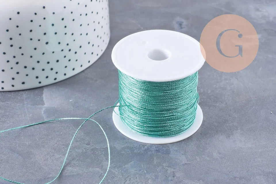 Gingerlily Cordons G10064 fil polyester vert or 0,4mm bobine 50m
