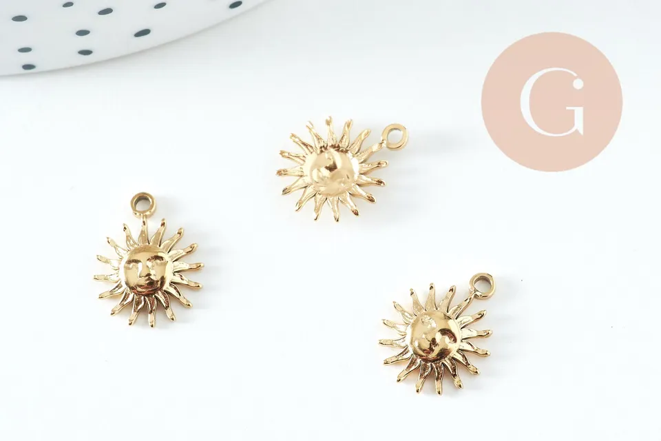Gingerlily pendentif soleil acier doré 14,5mm x1 G10734
