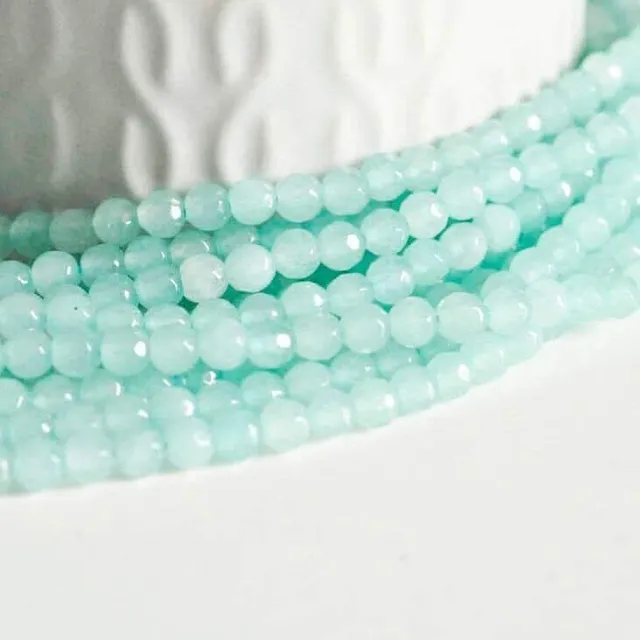 Gingerlily G668 perles jade facetté bleu turquoise 4mm fil 35cm