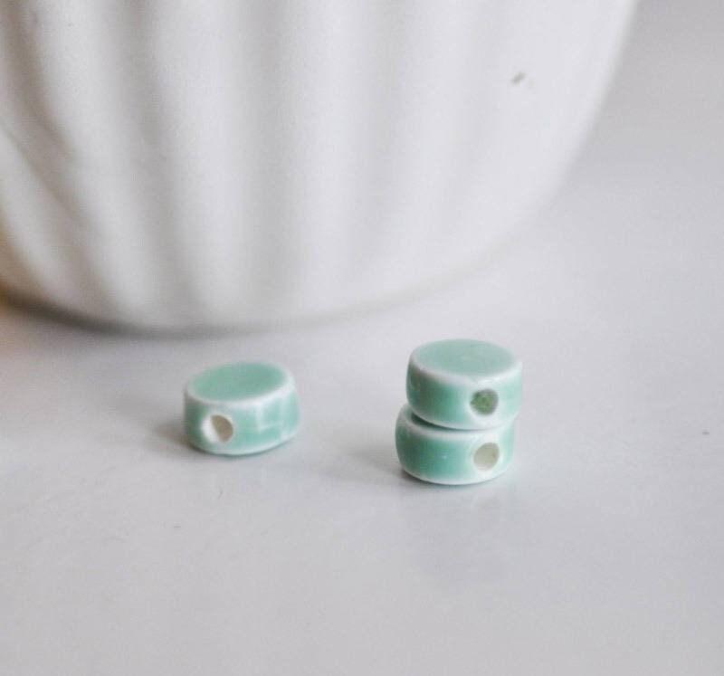 Gingerlily Perles porcelaine turquoise 13mm x10 émaillée